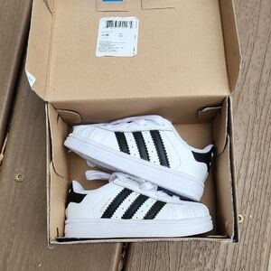 Adidas White and Black Superstar Sneakers with Shell Toe‎